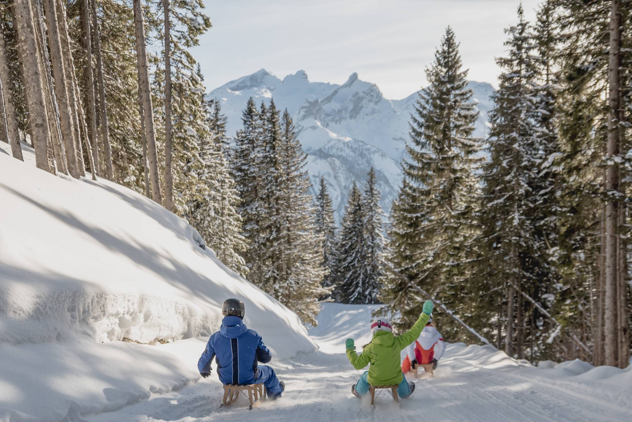 Faire de la luge pour petits et grands: Plaisir & action en hiver à Gstaad - Hotel Gstaaderhof